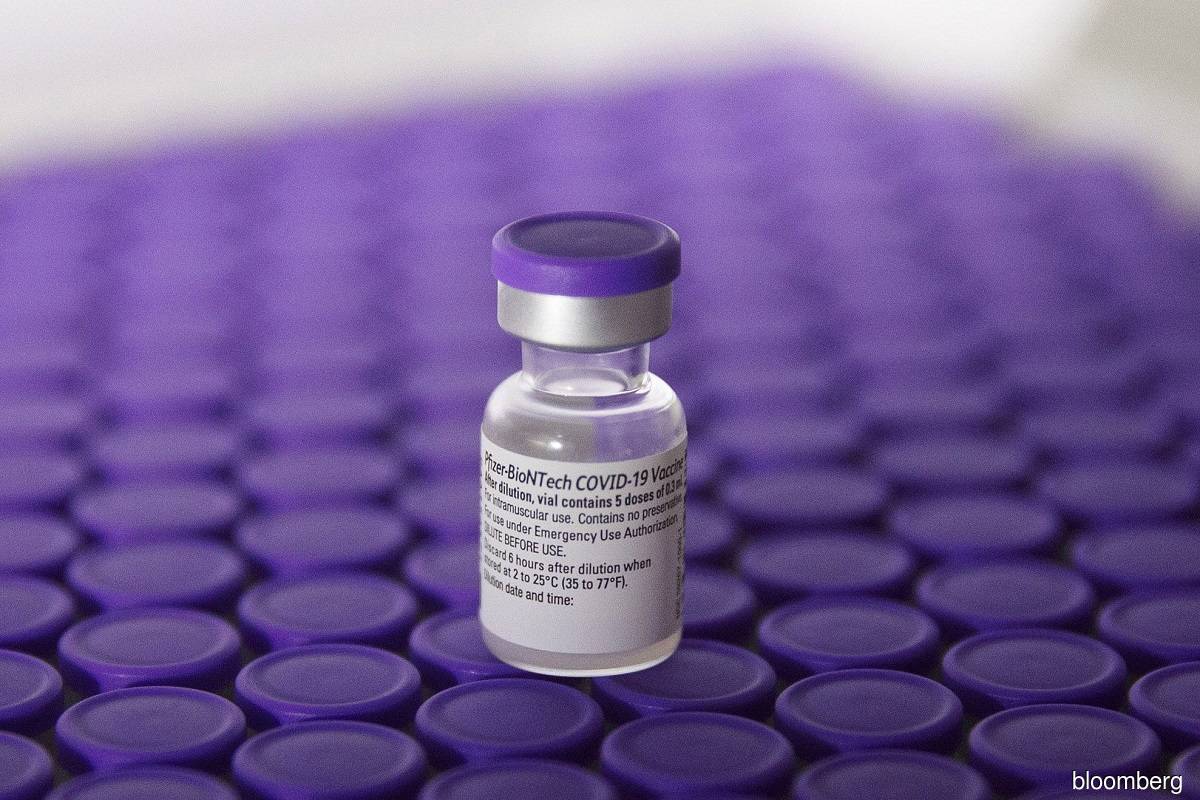Malaysia has signed an agreement with Pfizer-BioNTech to procure 12.8 million vaccine doses, and another 6.4 million doses will be provided by AstraZeneca as well as several other suppliers. (Photo by Bloomberg)